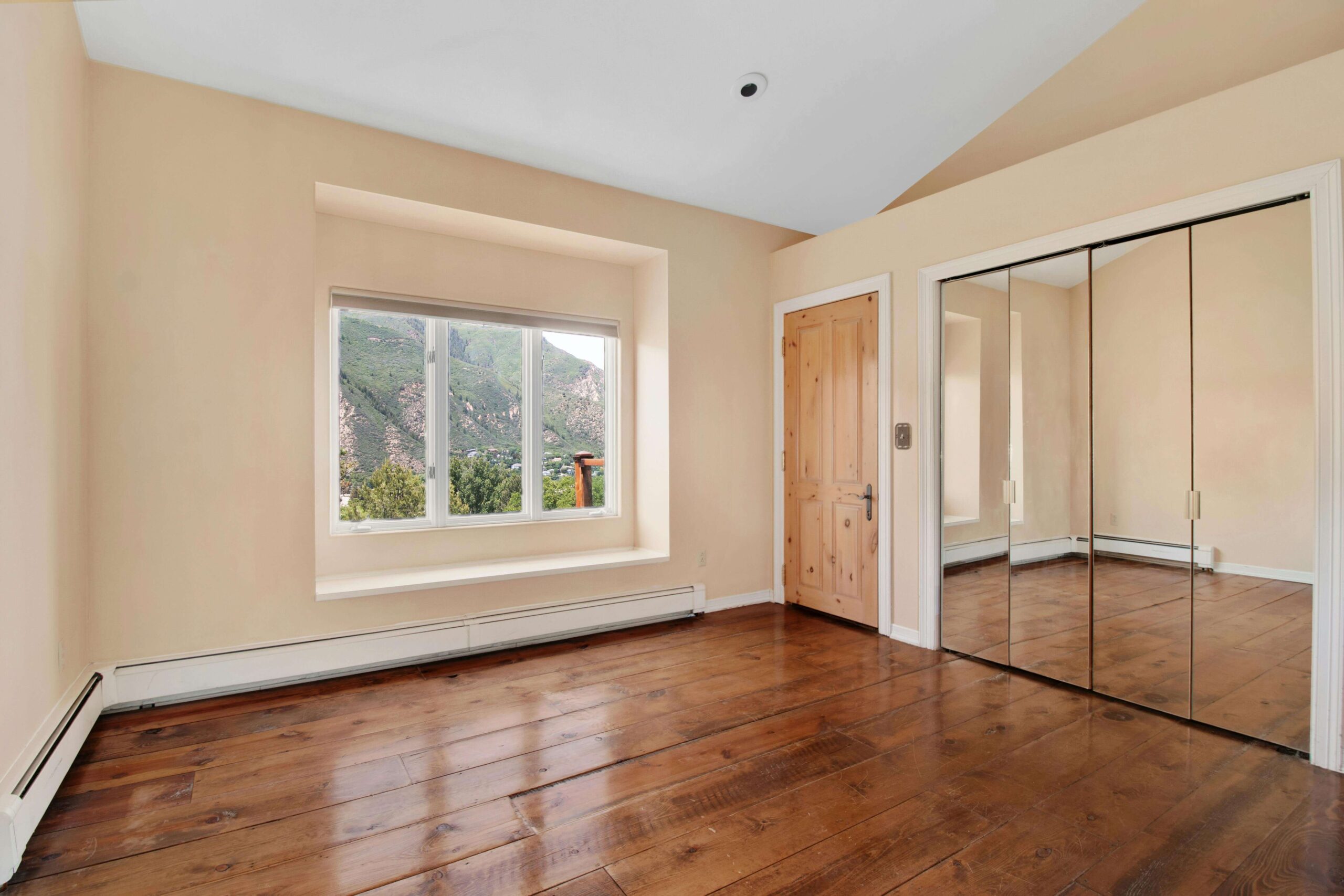 Baseboard heaters in empty room.