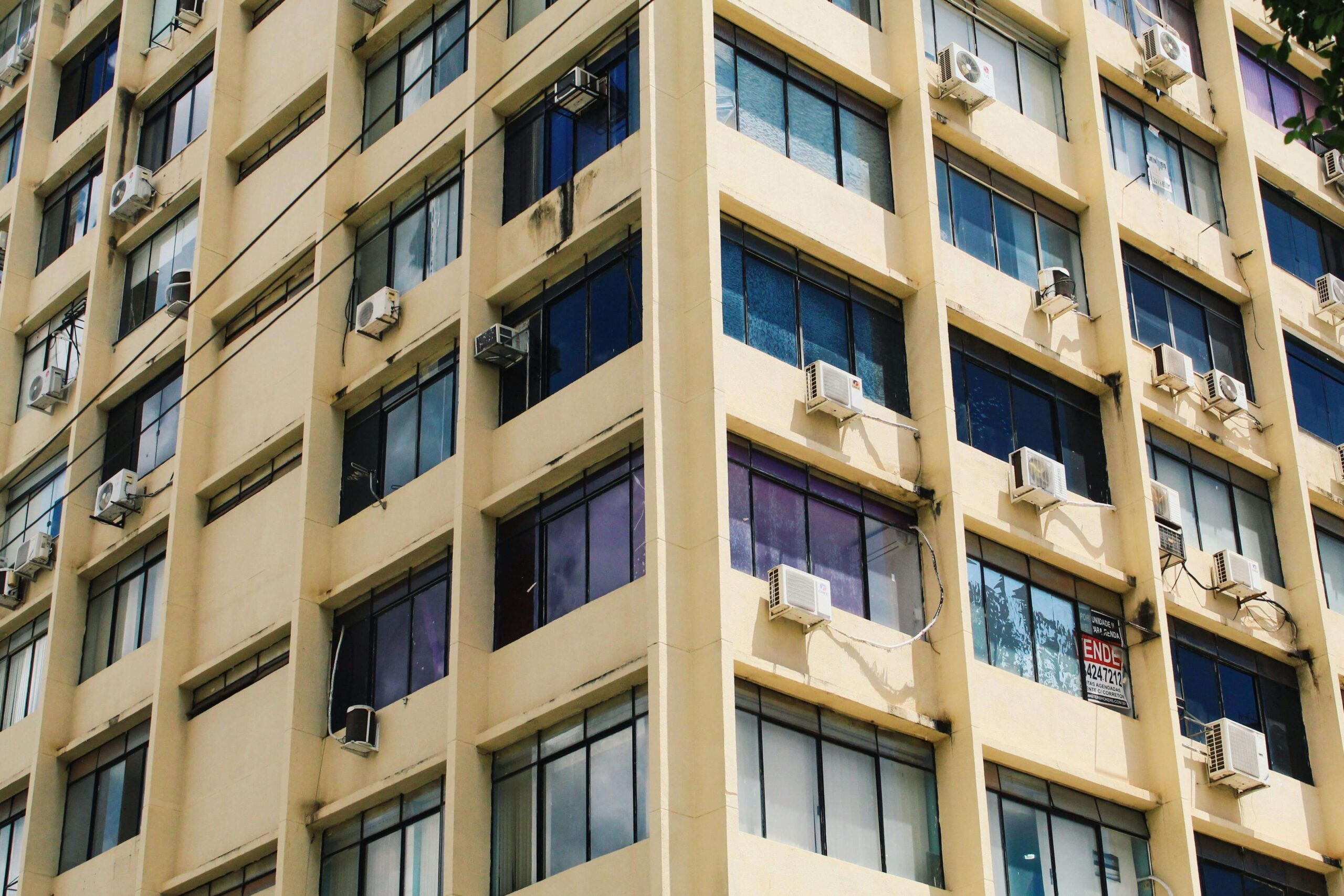 Window A/C units in a condo or apartment building.